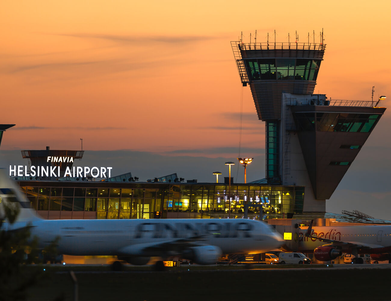 Helsinki Airport and the traffic control tower at night. Photo: Finavia Image bank