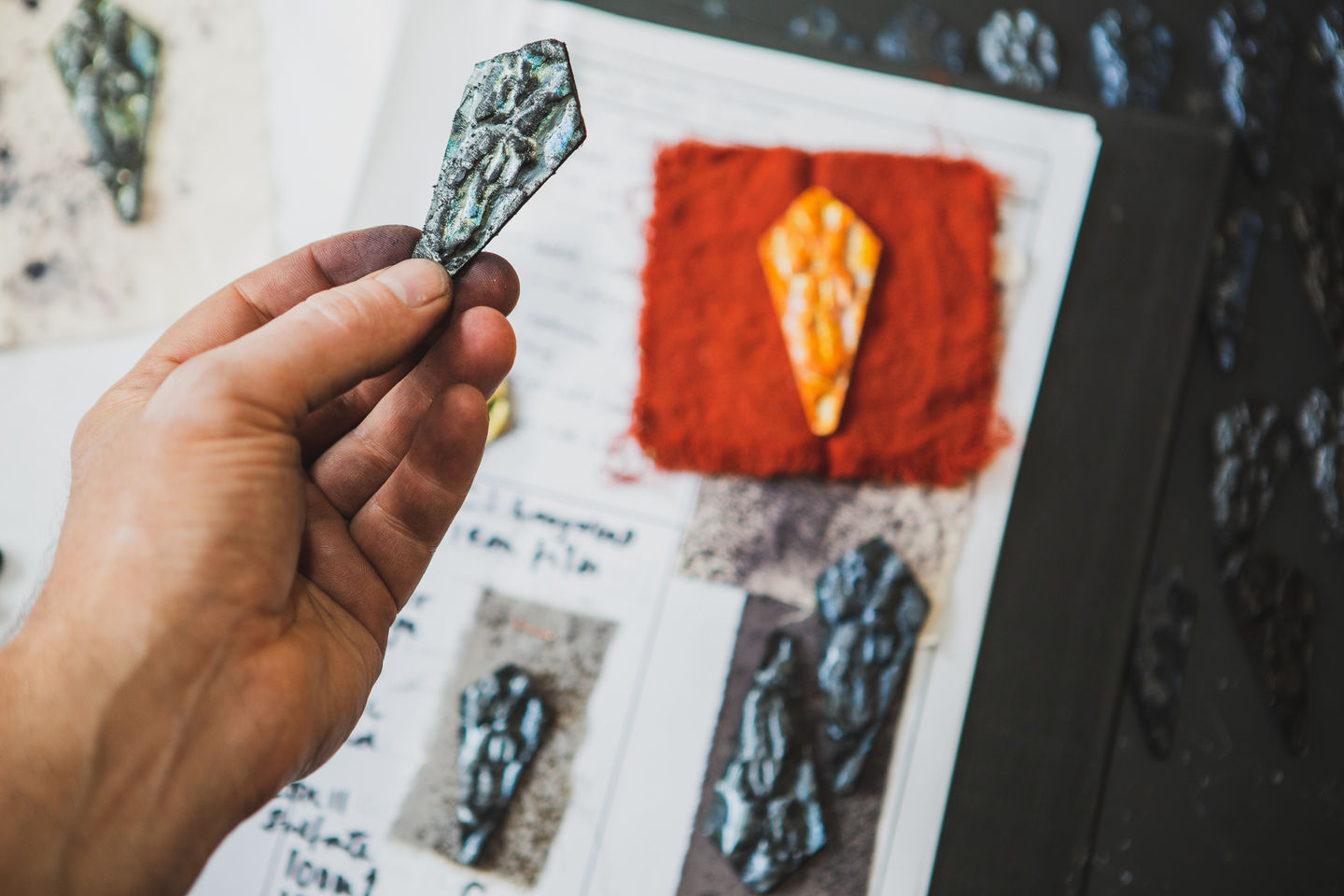 Hand showing costume components made with natural materials