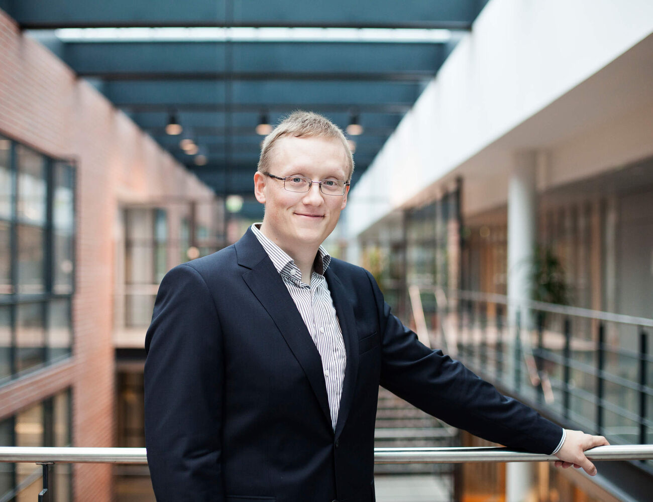 Antti at Aalto Unviersity smiling towards the camera