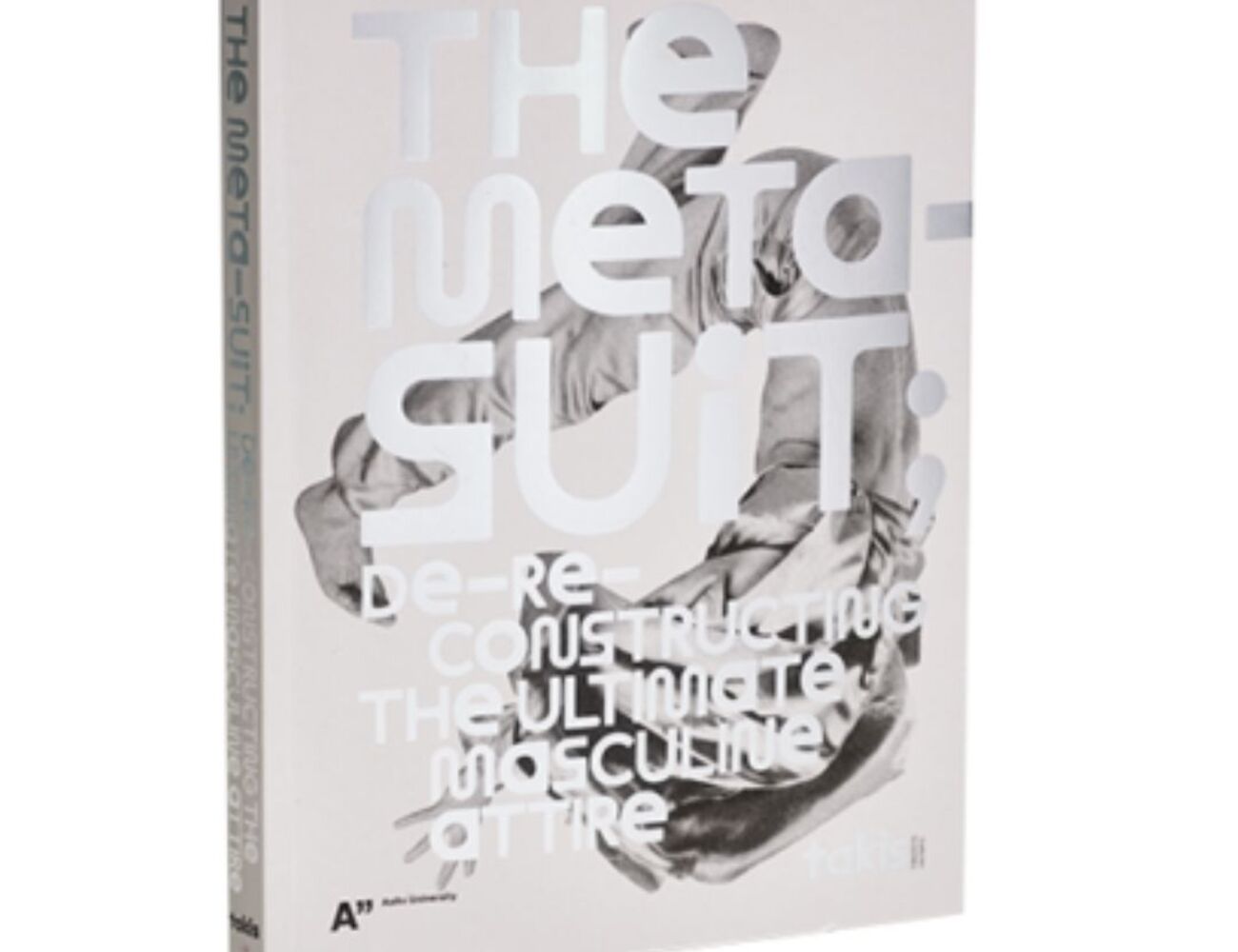 the metasuit. kansi. vaaleanharmaalla pohjalla kuperkeikkaa tekevä mies. Kirjan nimi päällä hopealla.