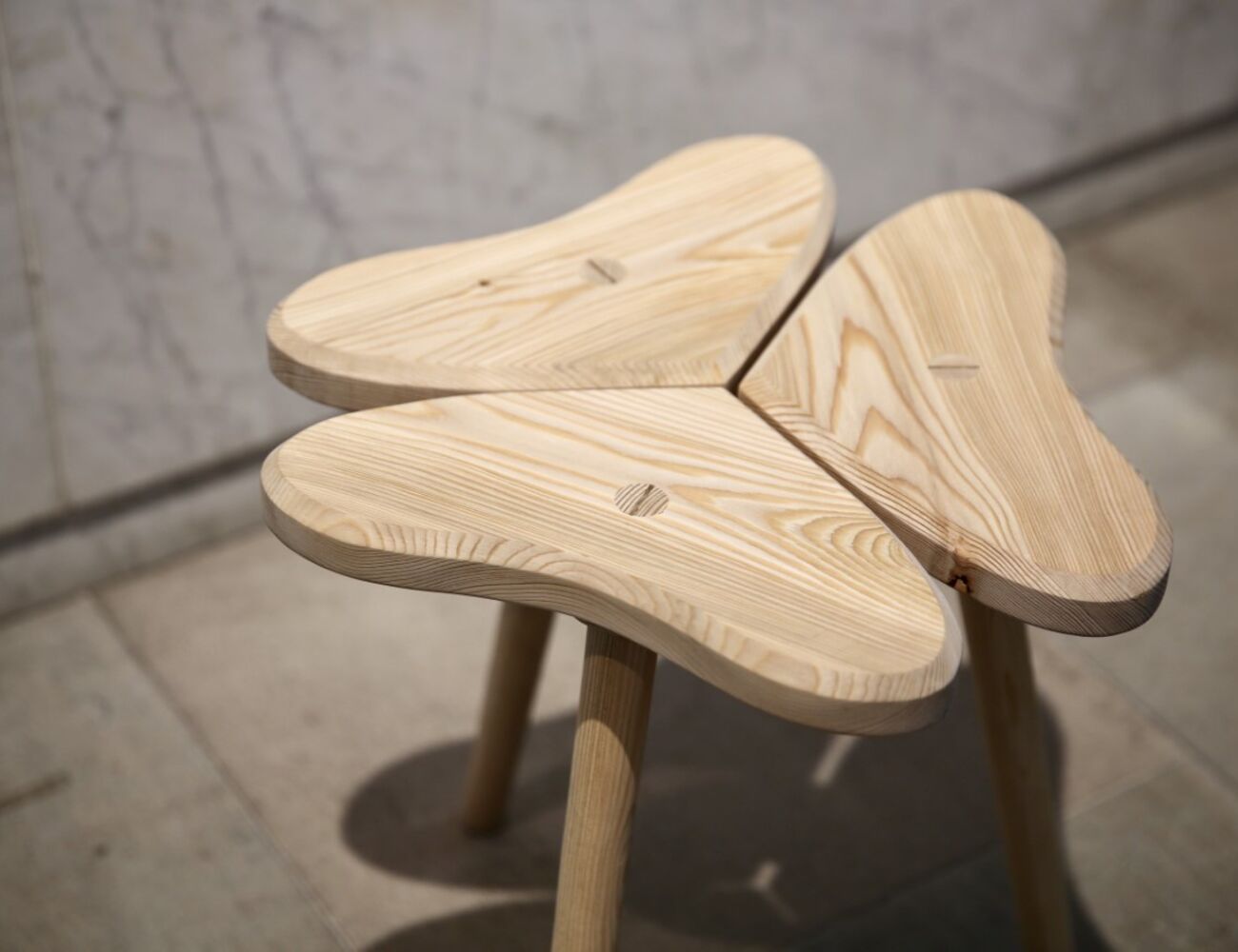 wooden stool in shape of clover