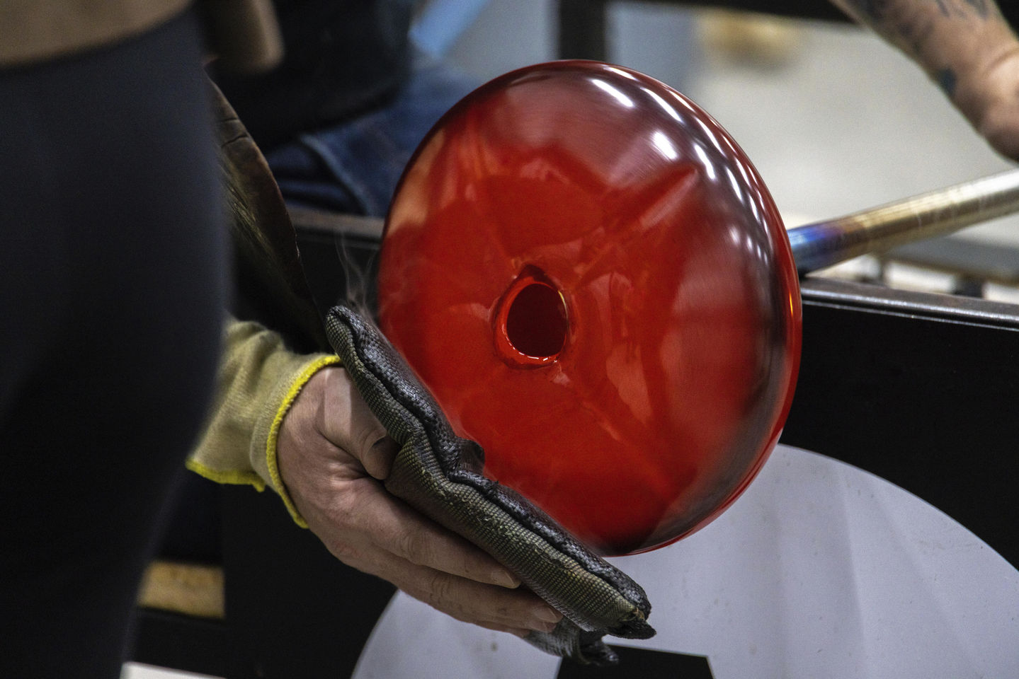 Hot glass being handled