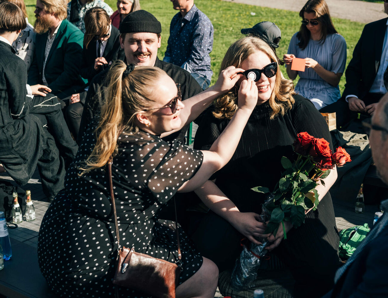 New graduates smiling and laughing together 