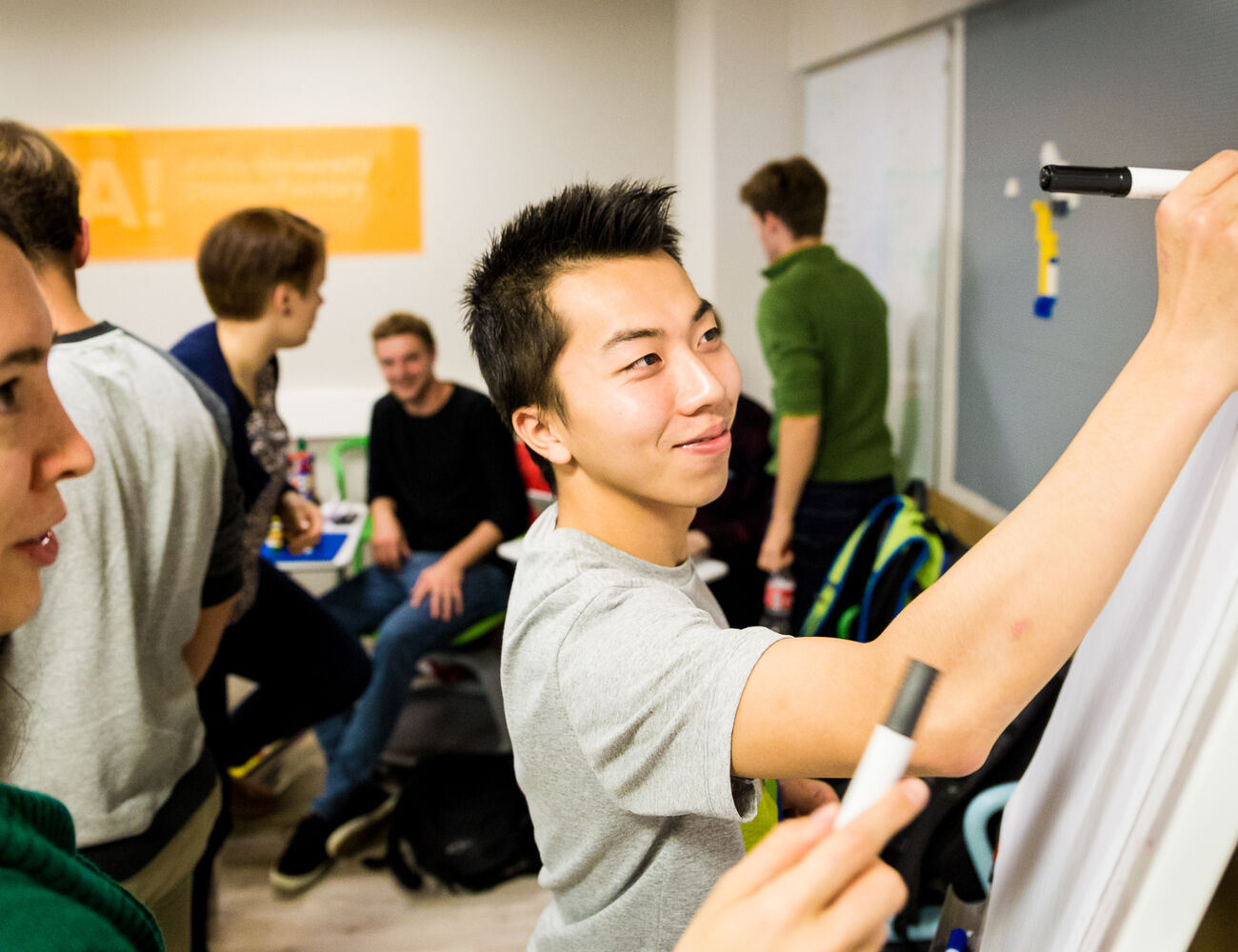 Students brainstorming at the Design Factory