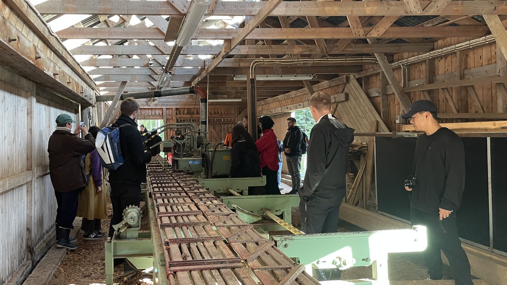 Inside of a shed with sawmill