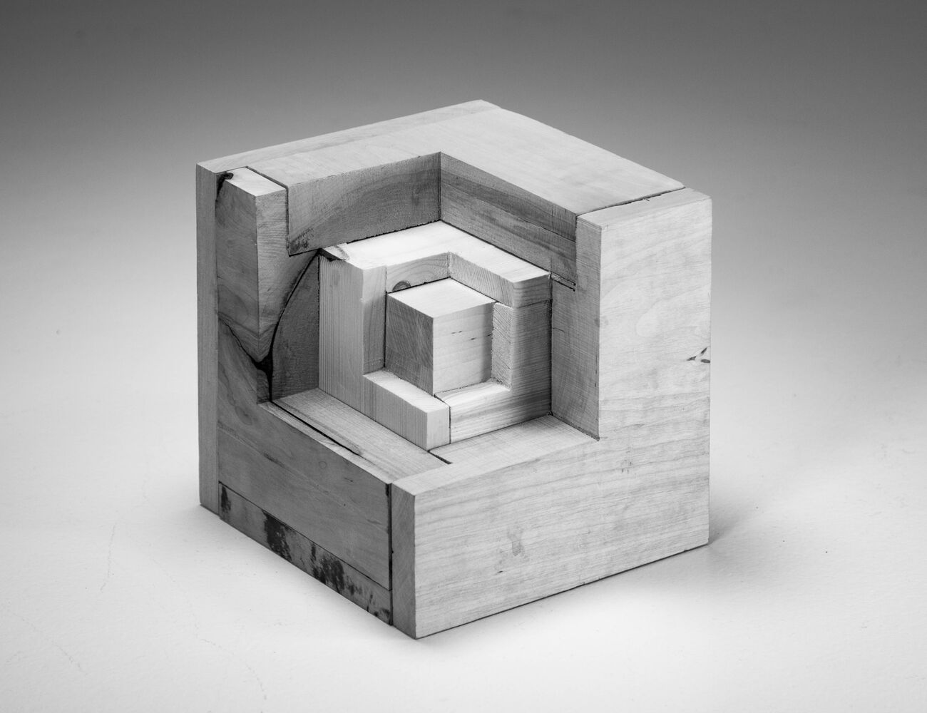 cube consisting of different species timber, the amount used corresponding to the amount of forest of that species in Finland