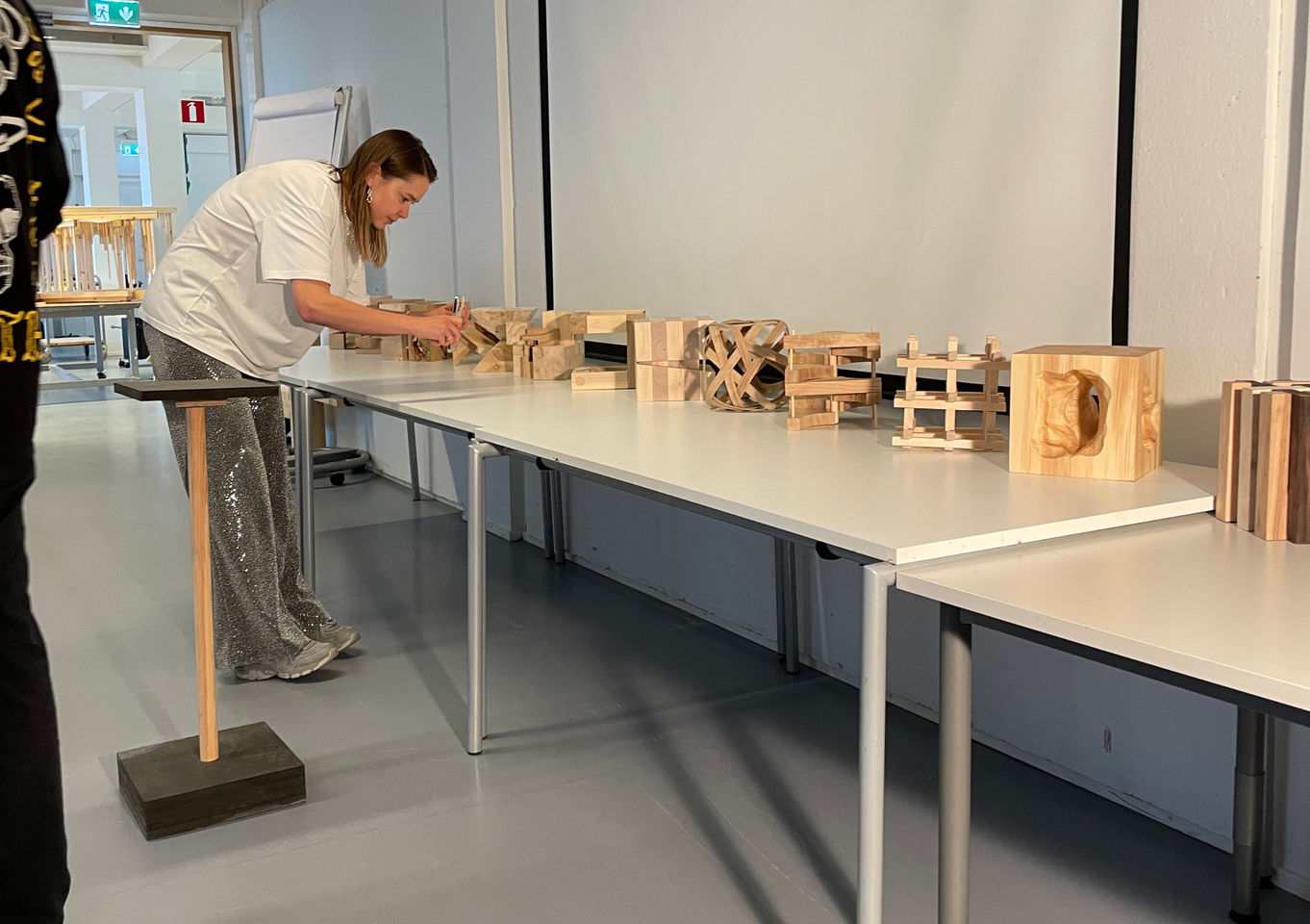 Cubes standing in a row on a table in classroom