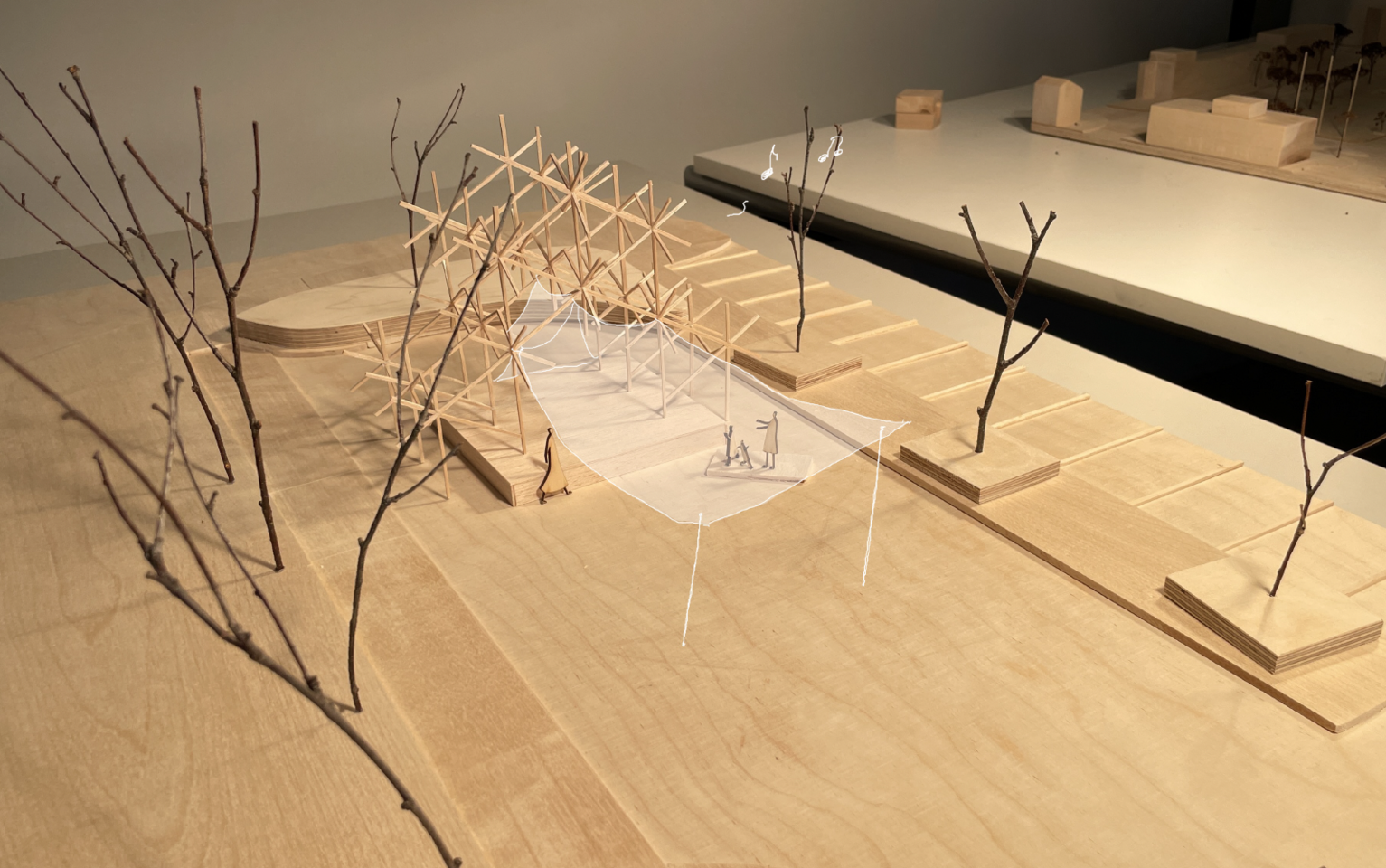 Photo of scale model of Lumilyhty with sketched over tarp roof