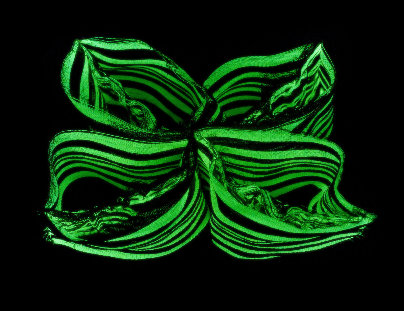 A light-reactive textile sample part of Entangled exhibition in Designs for a Cooler Planet 2024.