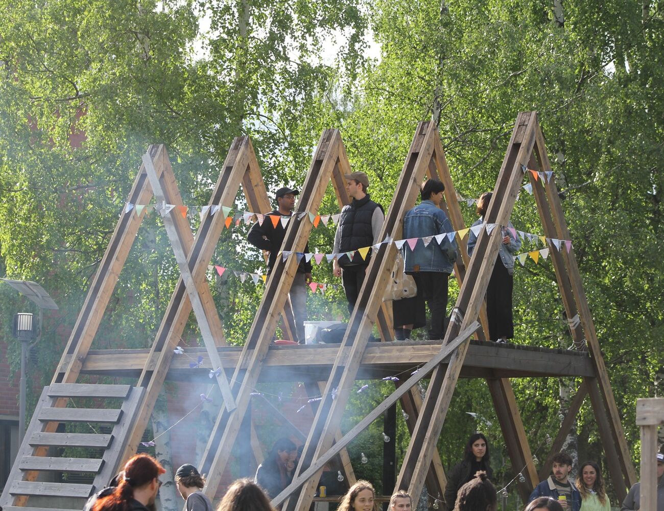 Students in the A-frame at a Test Site party.