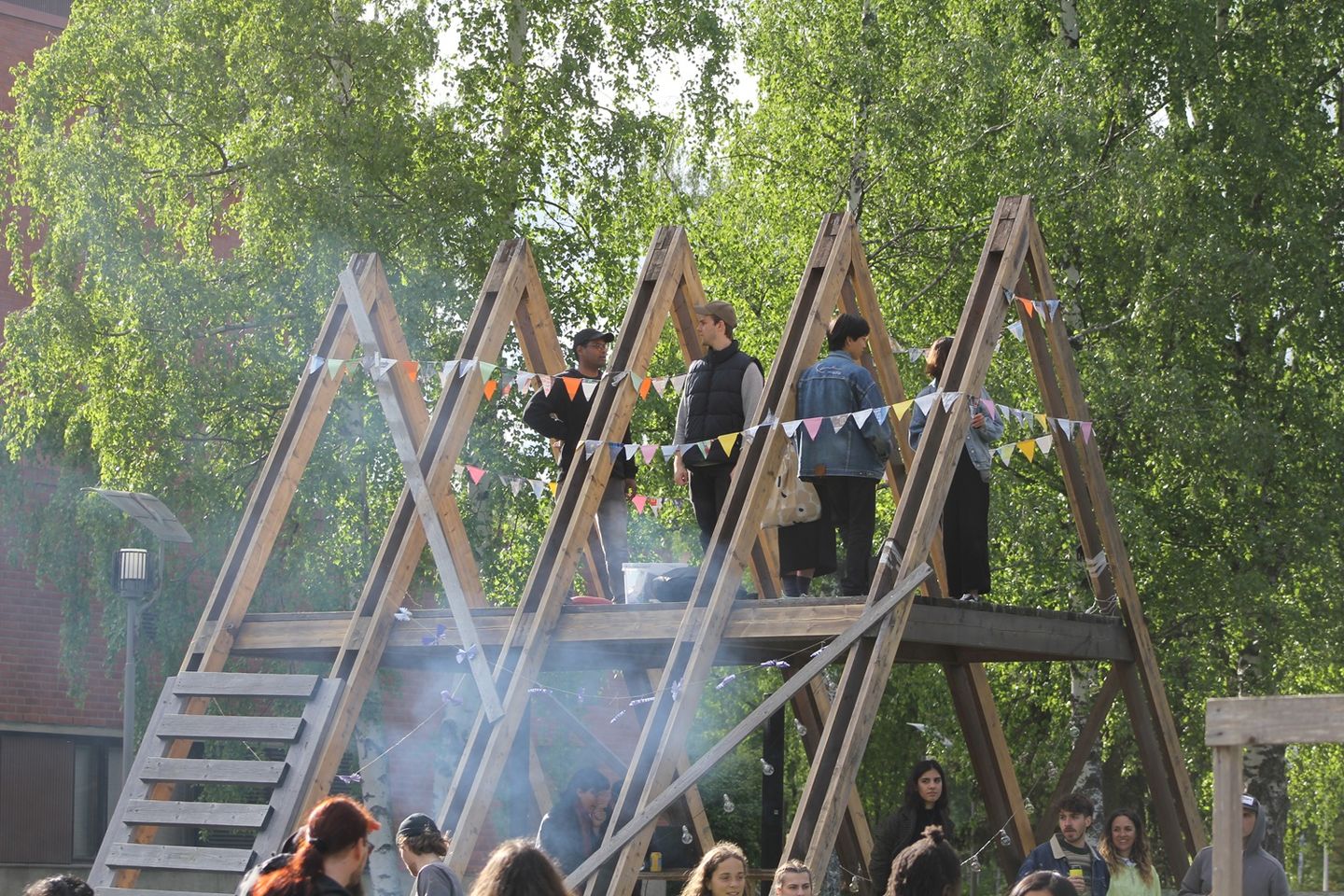 Students in the A-frame at a Test Site party.