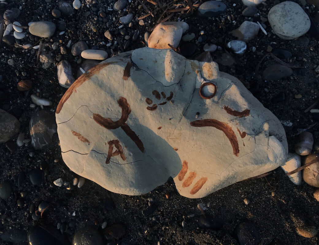 Gesture #2, Maria Andreou. Coastal rocks are inscribed with pigment