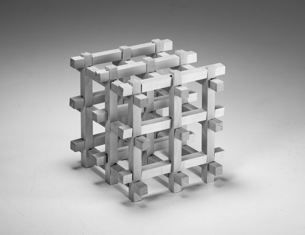 cube consisting of smaller wooden slats joined together