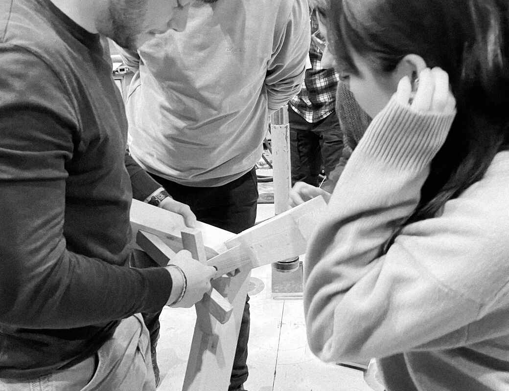 Students analysing the breaking point of one of the joints