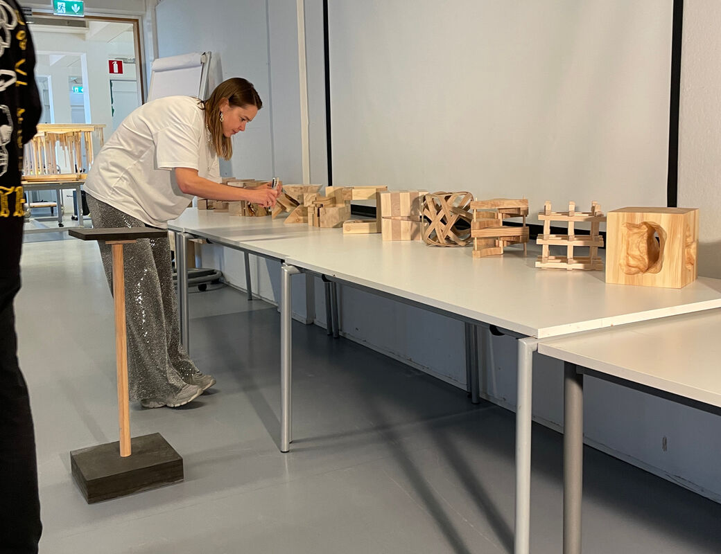 Cubes standing in a row on a table in classroom