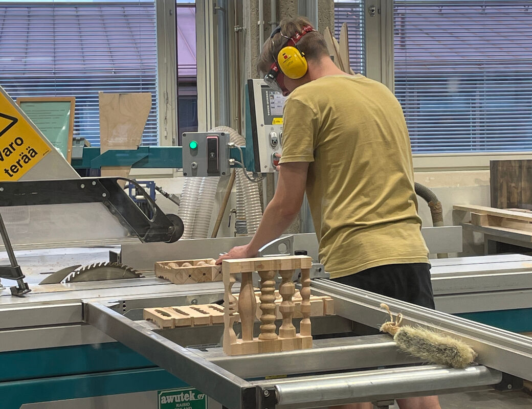 Student using table saw