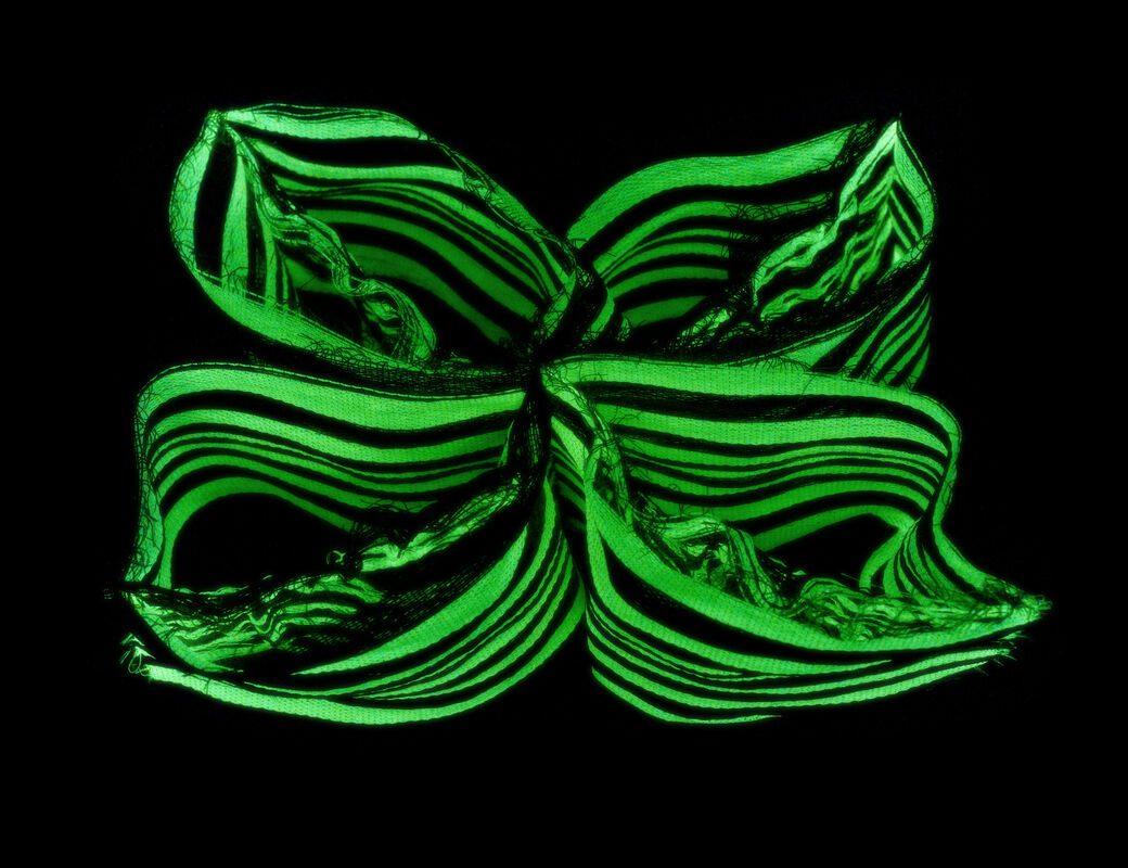 A light-reactive textile sample part of Entangled exhibition in Designs for a Cooler Planet 2024.