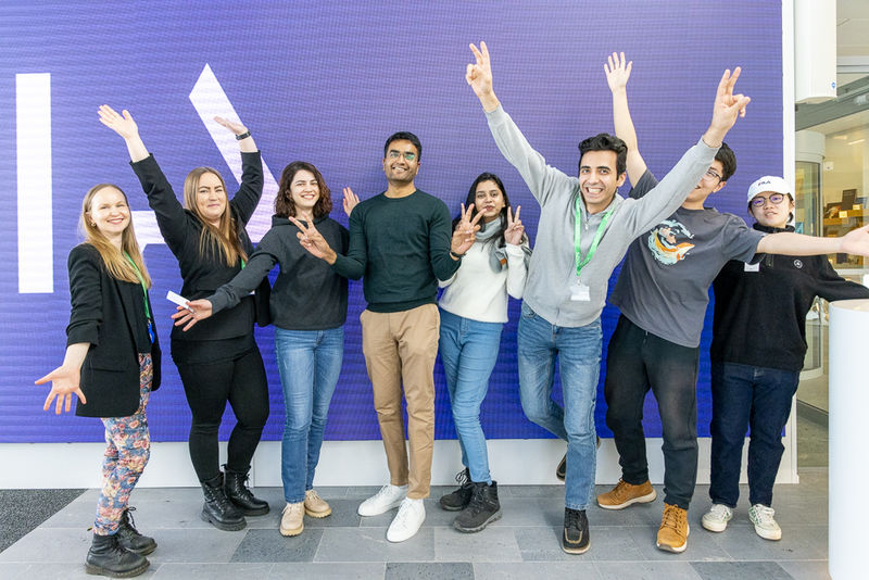 A group of students standing in a row