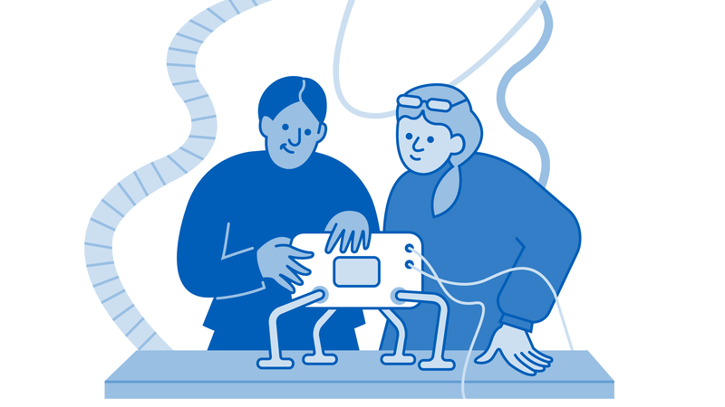 Kaksi henkilöä työstää robottia.