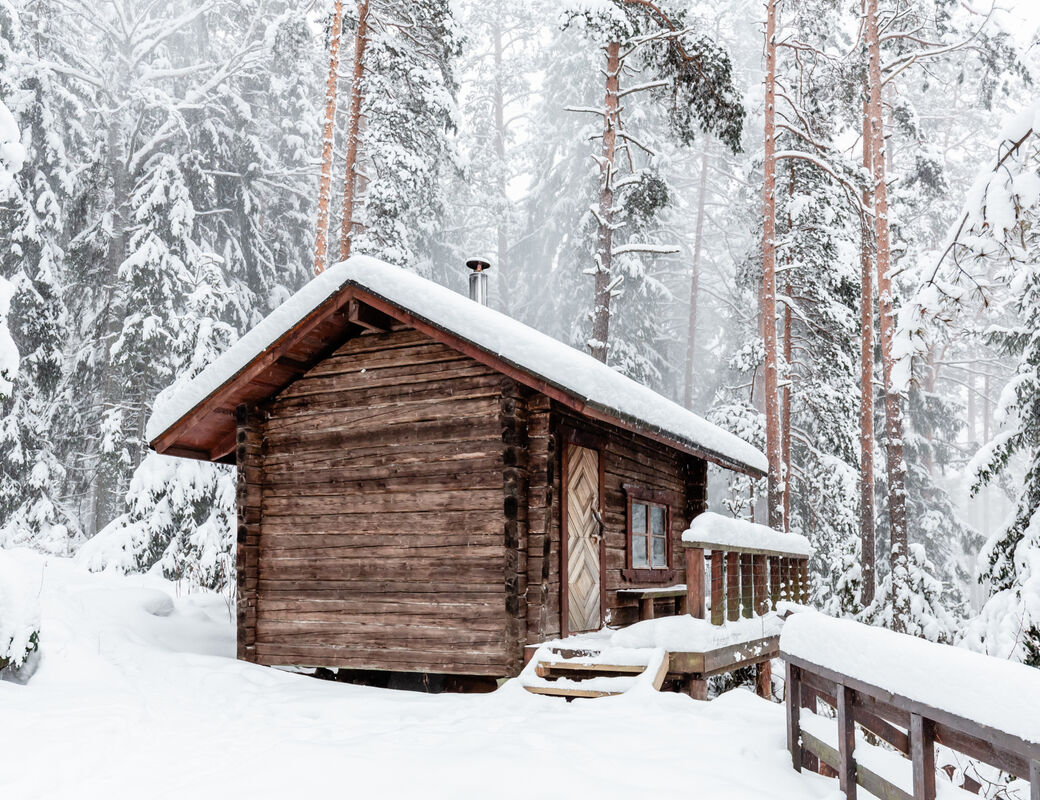 Cottage in snowy forest in Finland. Photo: Natura Viva / Helsinki Marketing.jpg