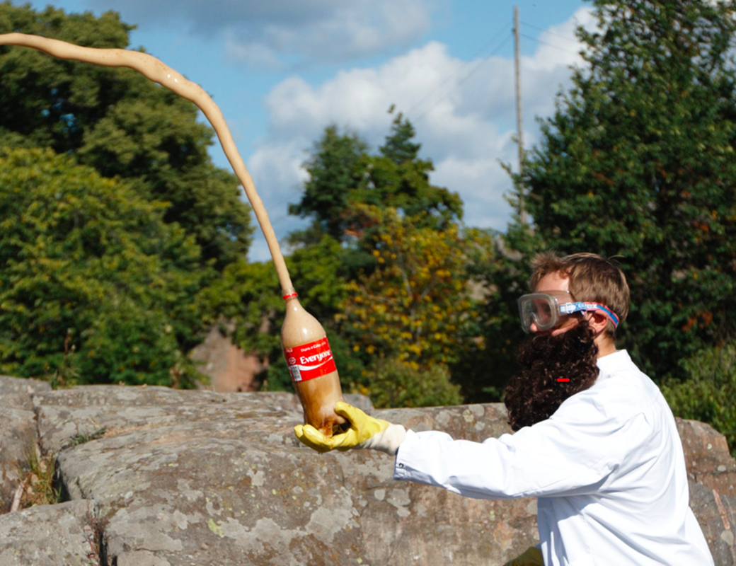 Juhani with a bottle of Coca Cola