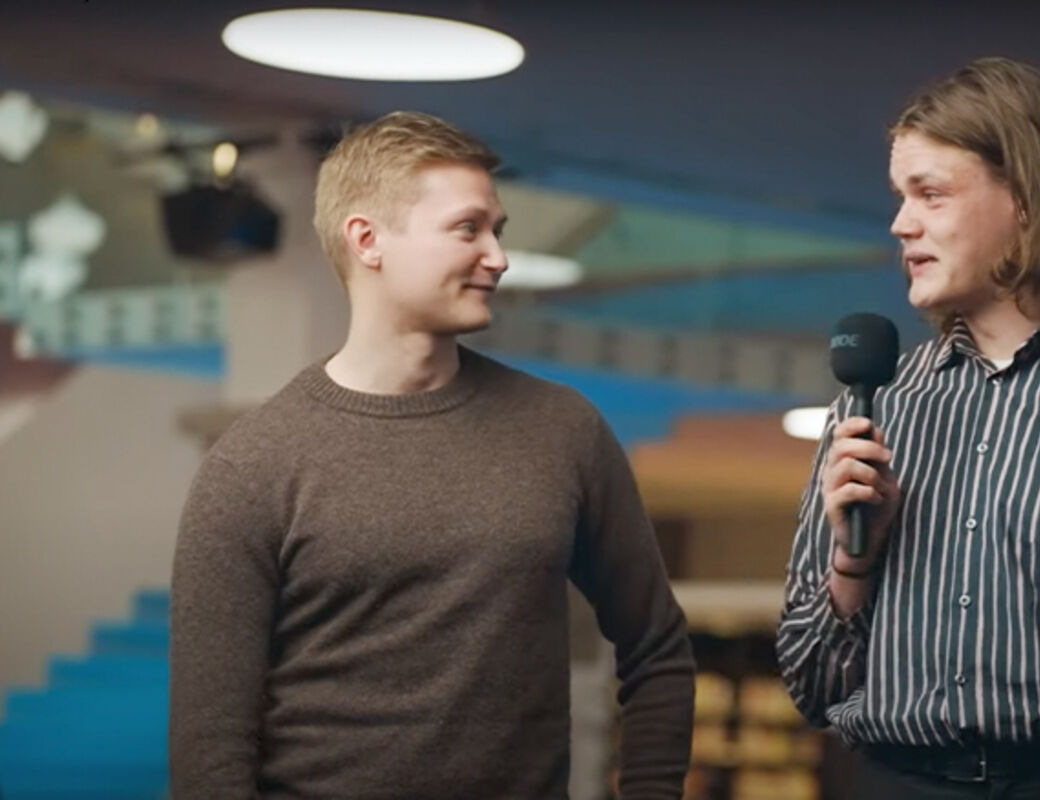 A student interviewing Aalto University alumnus for a video
