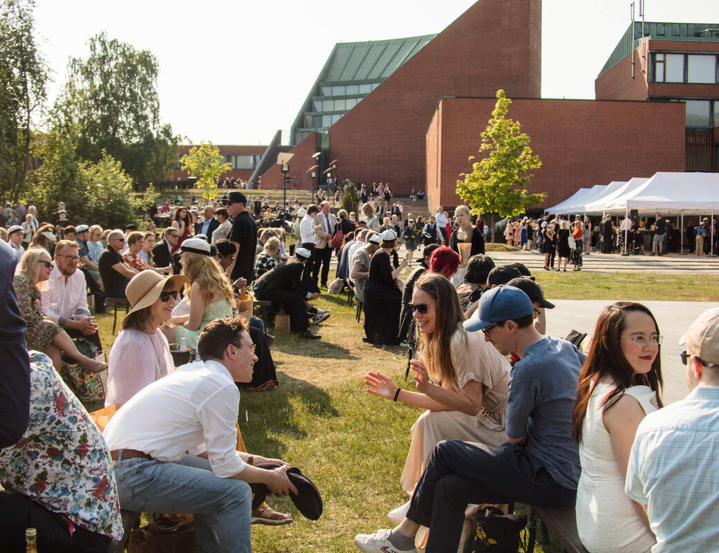 Joyful guests of Graduation Party in Alvar Aalto park