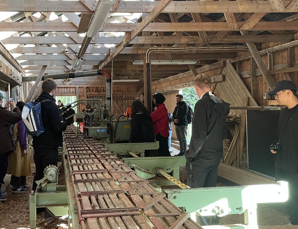 Inside of a shed with sawmill