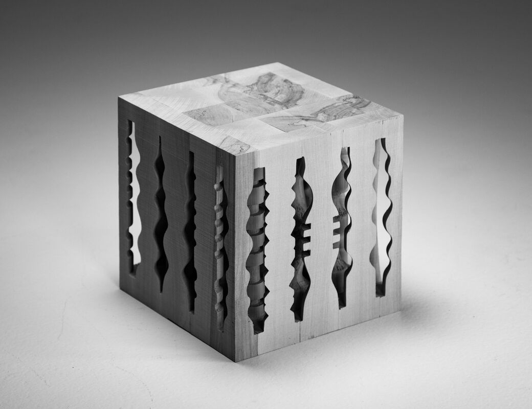 wood cube made by turning wood