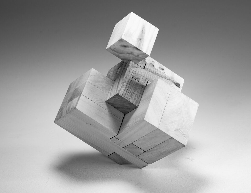 cube consisting of interlocking wooden pieces, japanese joint