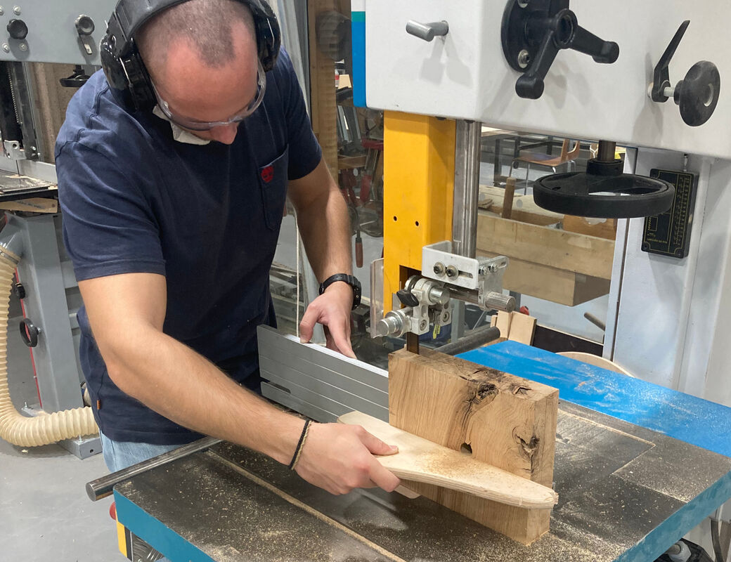 Student using bandsaw