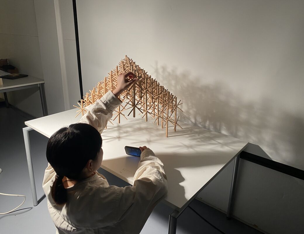 Student working on scale 1 to 20 model