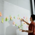 An ITP student brainstorming with post-it notes