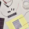 Solar cells laminated on the back side of textiles in the Sun-Powered Textiles project