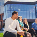 Aalto University students enjoying sunny weather