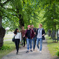 Group of people interacting outside Aalto University campus