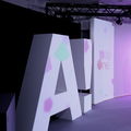 Aalto logo standing in purple coloured lights