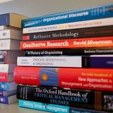 Two stacks of business books
