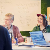 Students in front of whiteboard, photo by Unto Rautio / Aalto Material bank