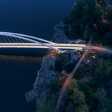 A bridge by the sea, image shot from the air in the evening. Photo by Aalto University / Aleksi Poutanen