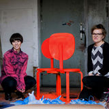 two women and chairs