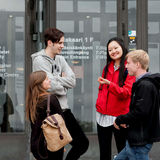 Aalto University students in front of the main building. Photo: Aalto University / Aino Huovio.