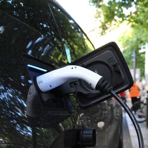 Electric vehicle charging. Photo by Andrew Roberts on Unsplash