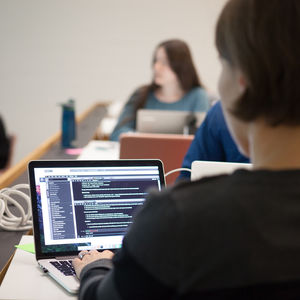 Person using laptop at Coderefinery workshop, photo: Matti Ahlgren / Aalto University