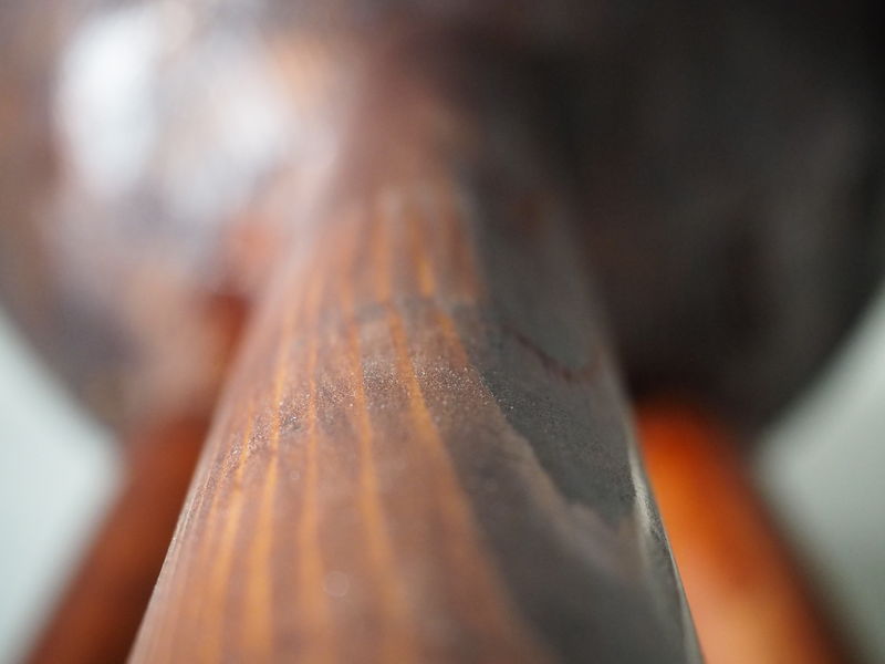 Brown lignin coating on a wood sample