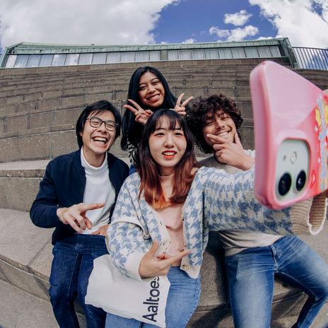 Group of students taking a selfie on the Aalto University Campus