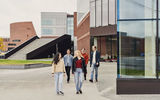 Students walking outside the building of the School of Business. Photo by Unto Rautio