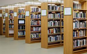Bookshelves full of books at Aalto University Learning Centre