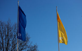 Blue and yellow Aalto University flags