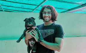 Abhiteg Jammu with a dog